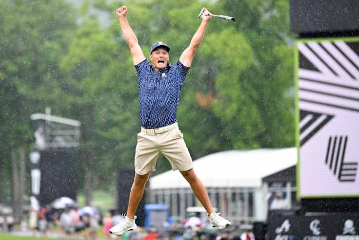 Bryson DeChambeau of the United States celebrates his birdie putt on the 18th hole with a record 58 to win the LIV Golf Invitational - Greenbrier at The Old White Course on August 06, 2023 in White Sulphur Springs, West Virginia.